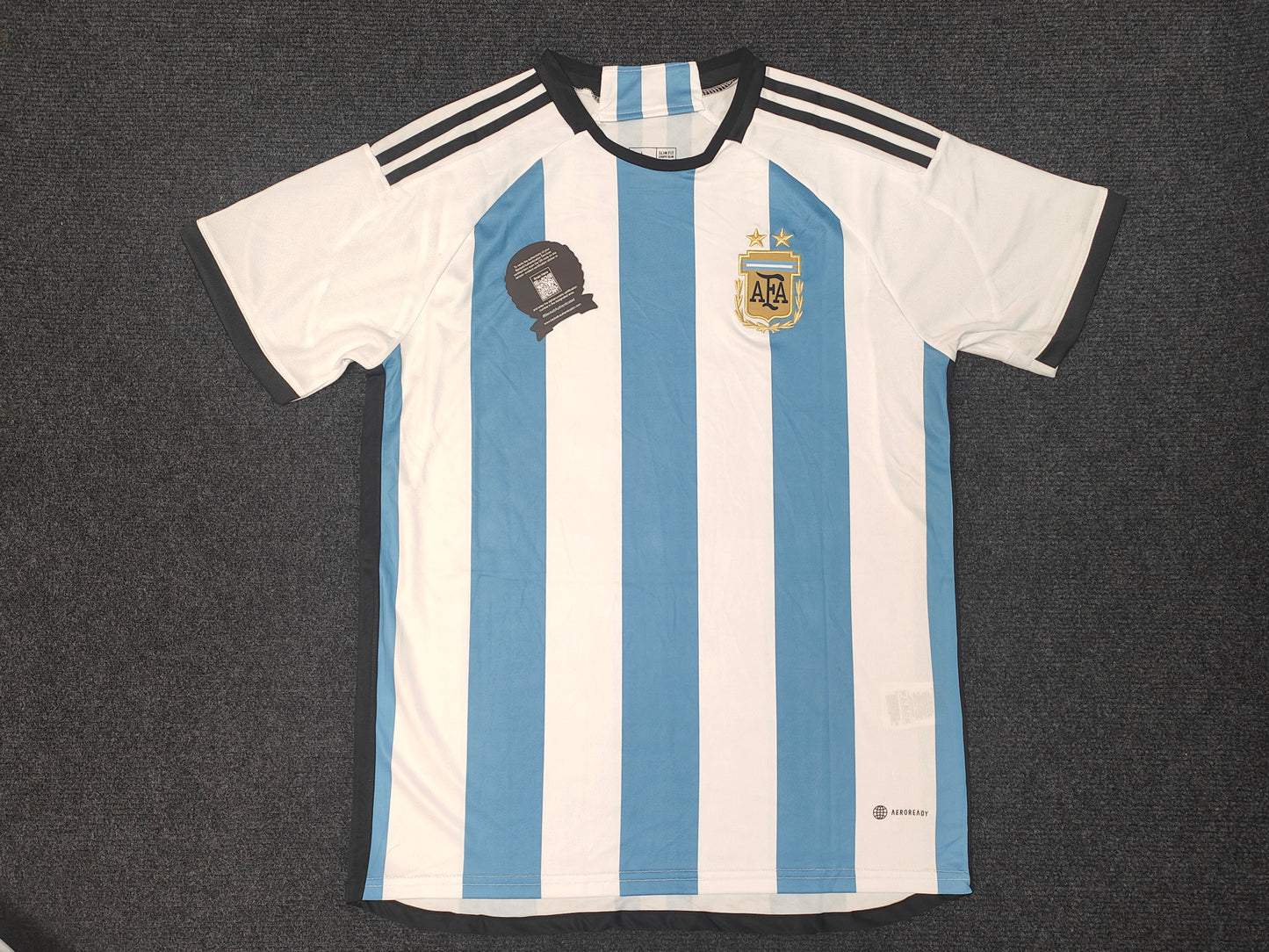 Camiseta autografiada de Messi Argentina Temporada 22/23 Local icons coa