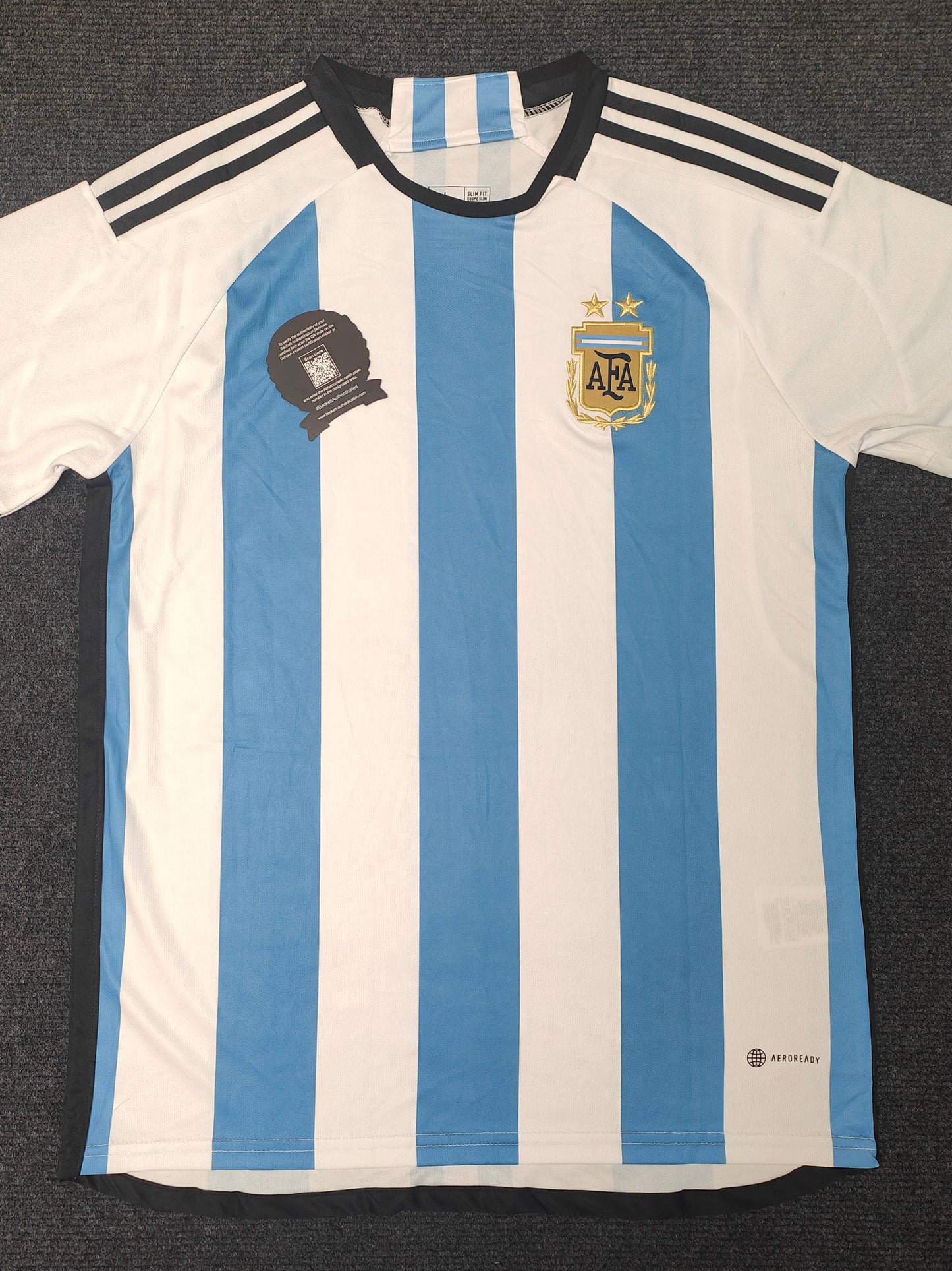 Camiseta autografiada de Messi Argentina Temporada 22/23 Local icons coa